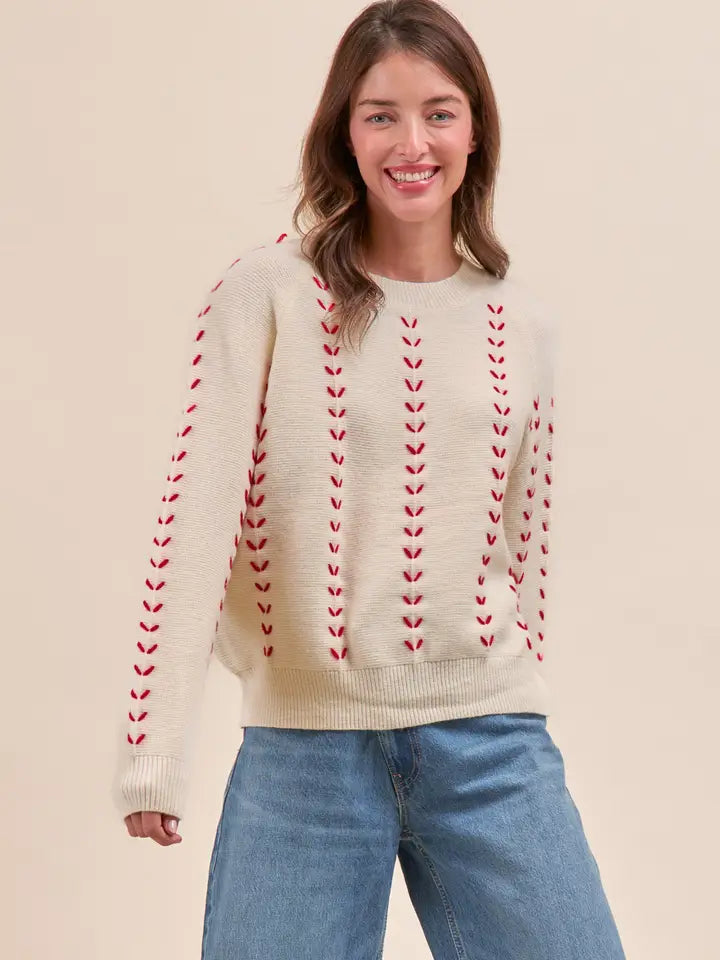 Ivory Sweater with Red Stitching